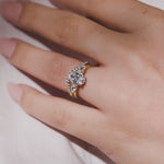 ROUND THREE STONE ENGAGEMENT RING