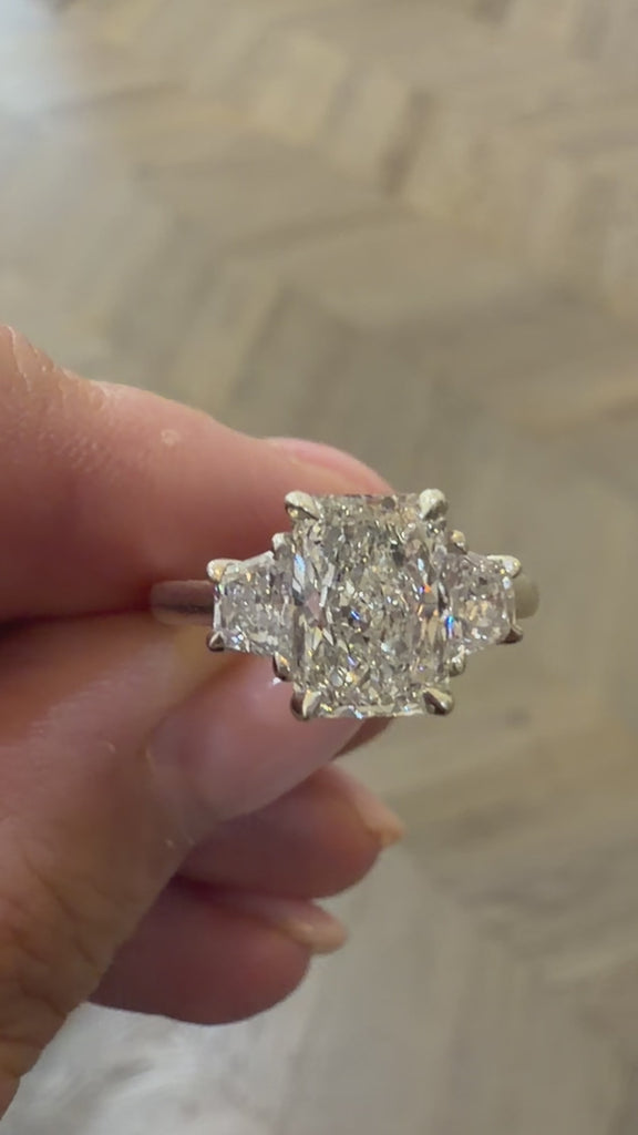 Radiant Cut 3 stone engagement ring
