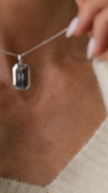 rectangular pendant on bead chain necklace