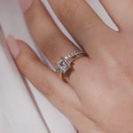 EMERALD CUT THREE STONE ENGAGEMENT RING