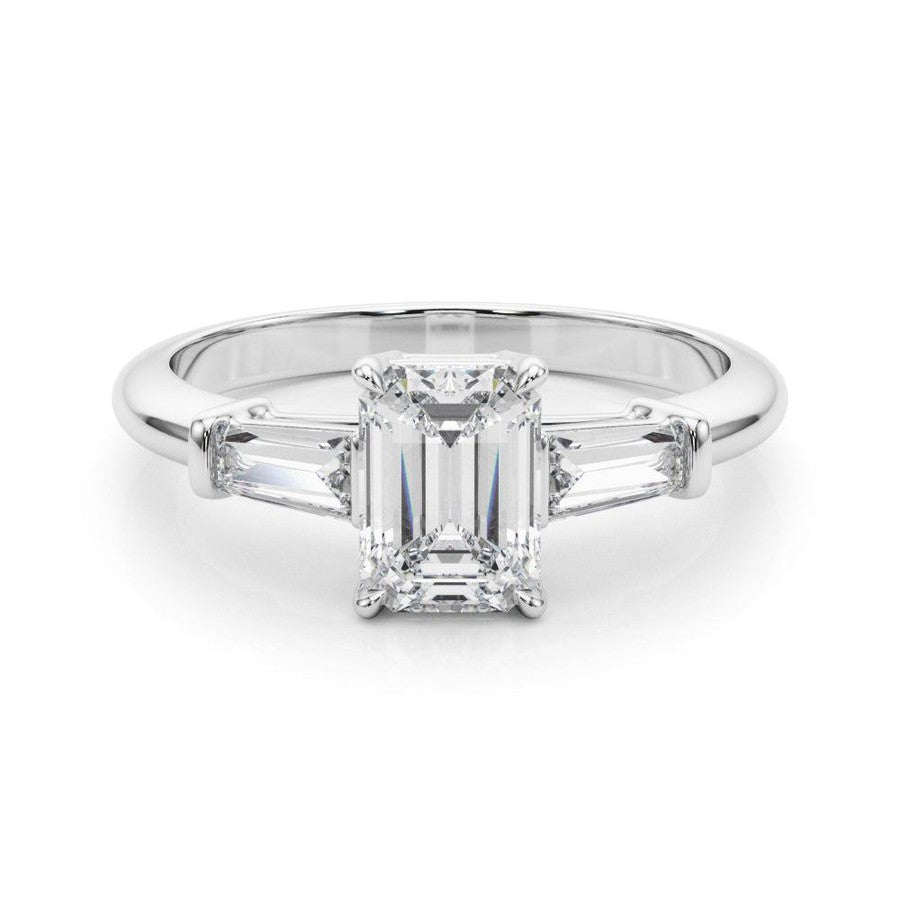 Three stone engagement ring with emerald cut centre and side stones