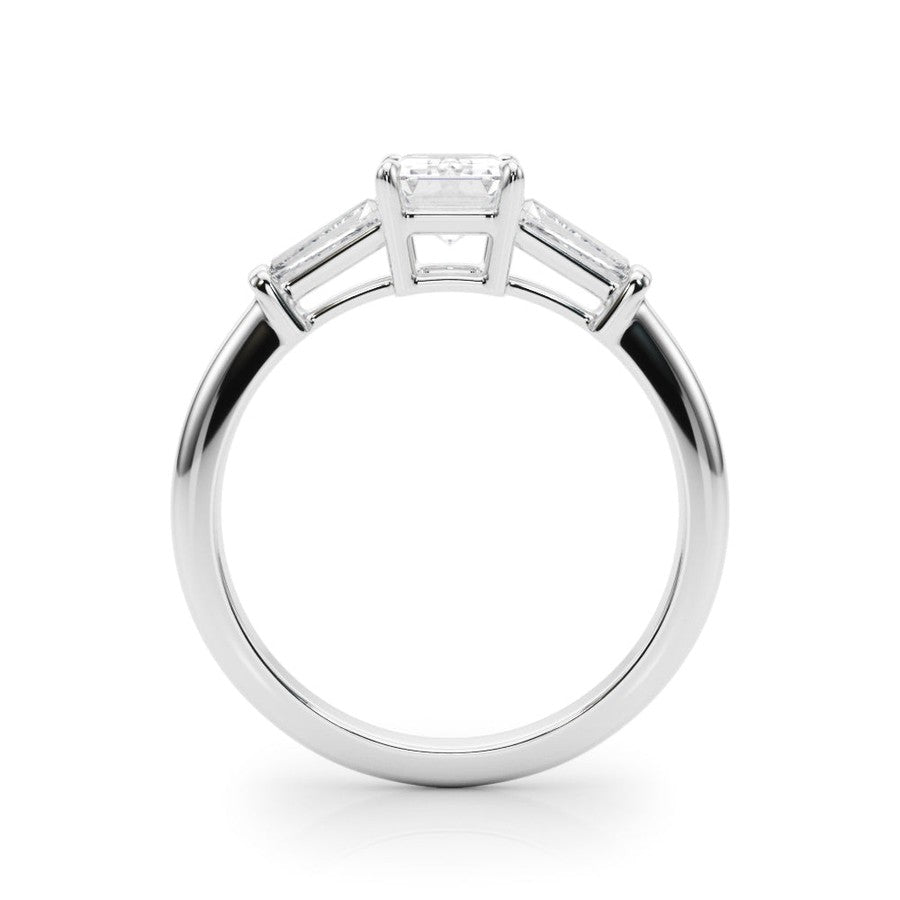 Three stone engagement ring with emerald cut centre and side stones