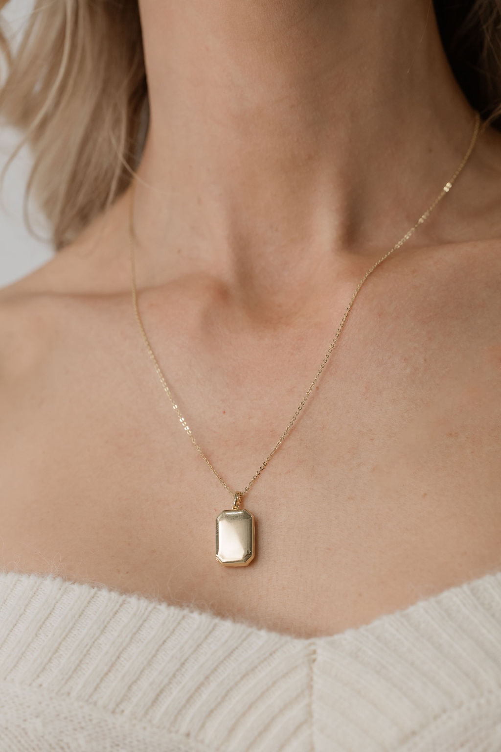 rectangular bevel locket on plain chain yellow gold 