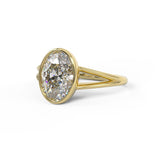 Bezel Set oval engagement with a split shank