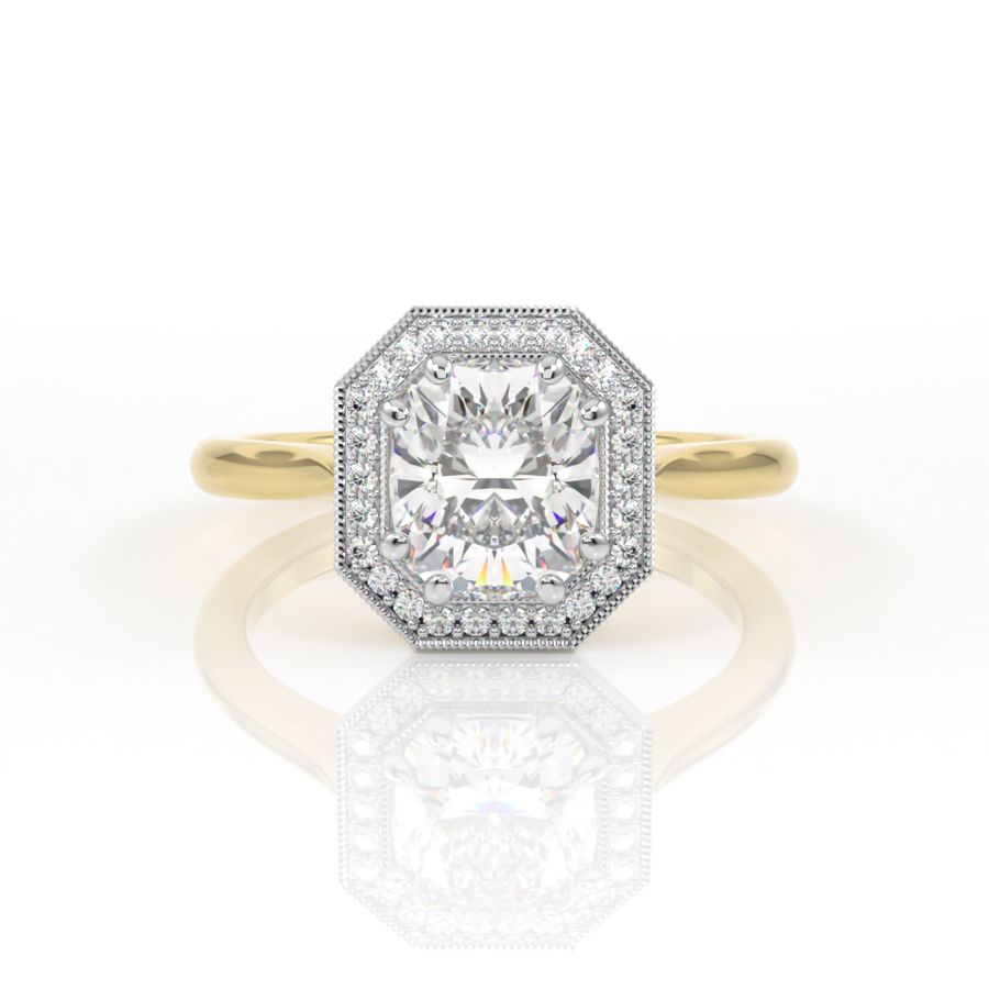 Elongated cushion cut engagement ring with a halo and millgrain detail