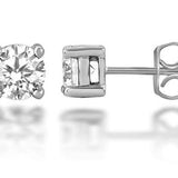 4 claw diamond stud earrings in platinum