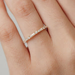 round diamond and baguette diamond wedding ring