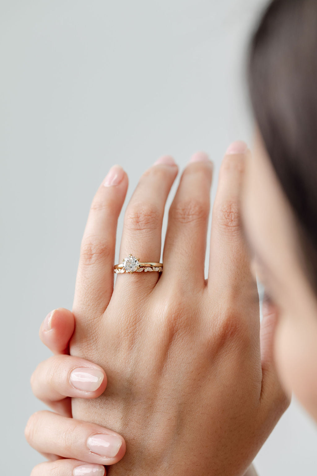 round diamond and marquise diamond wedding ring with round brilliant solitaire engagement ring
