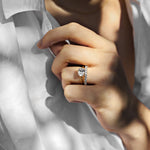 side set oval engagement ring with diamond sweeping scallop set wedding ring