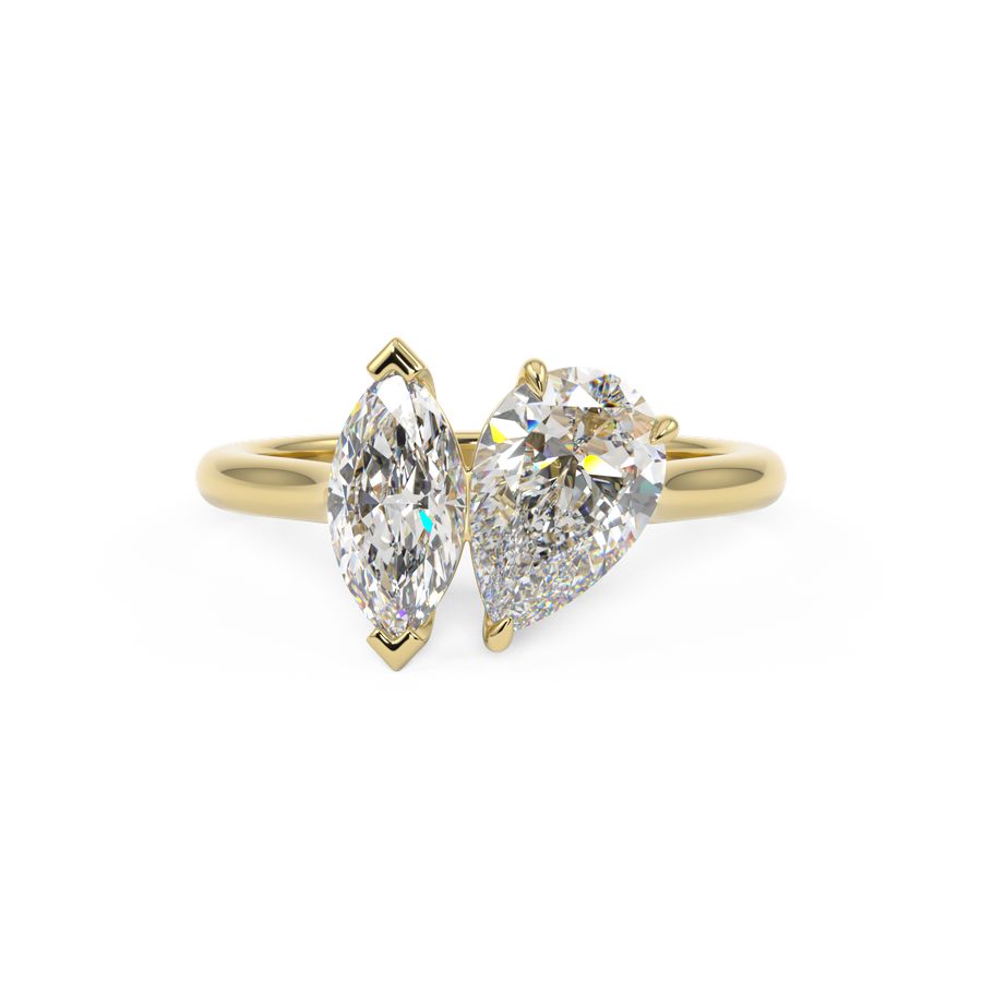 toi et moi engagement ring with pear and marquise shape diamond in yellow gold