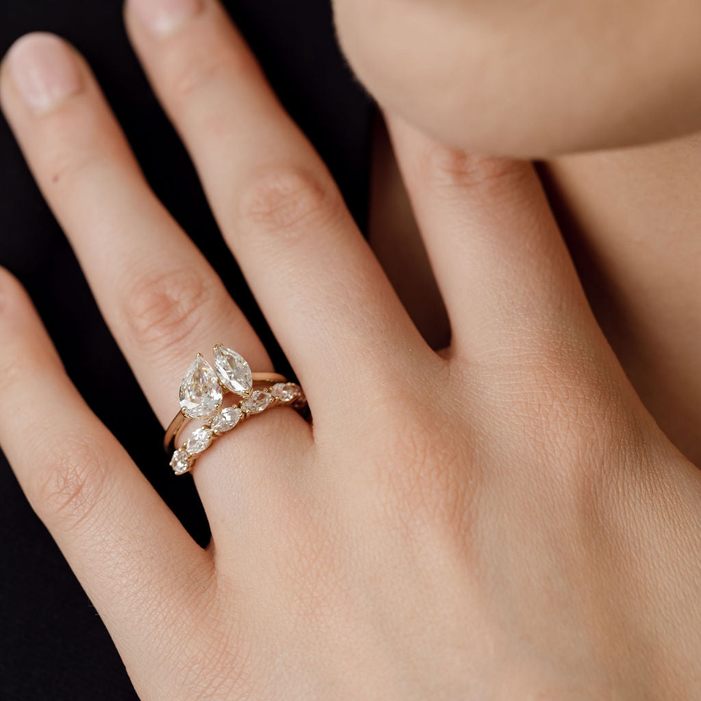 toi et moi engagement ring with marquise cut wedding ring