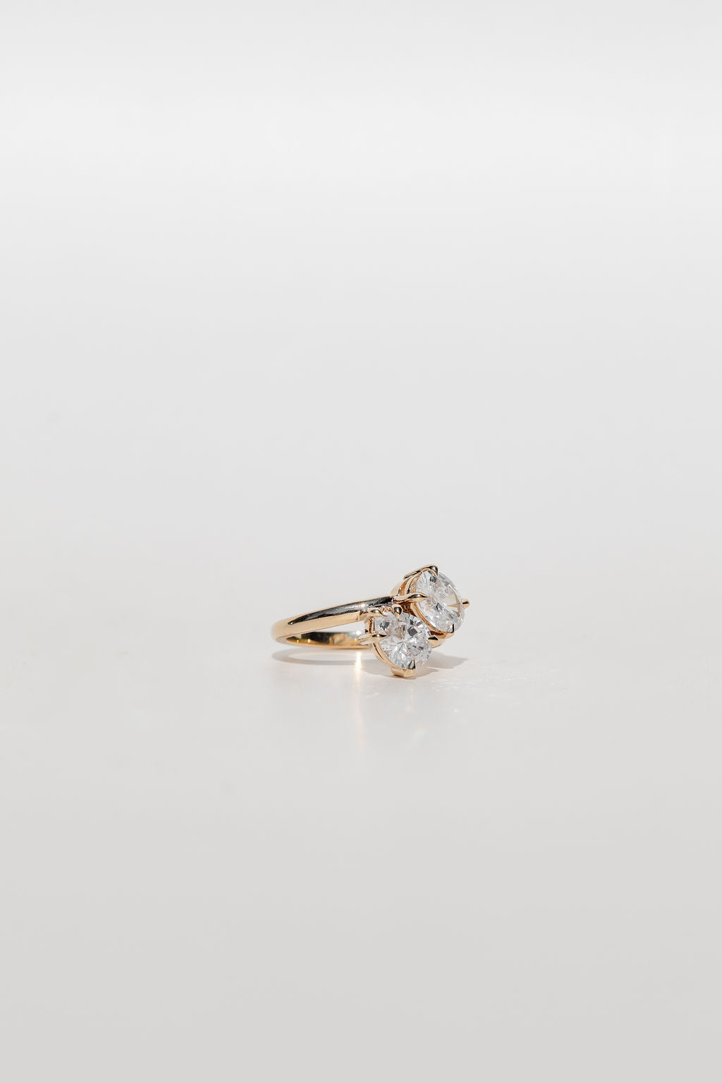 toi et moi diamond engagement ring with pear cut diamond and oval cut diamond