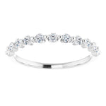 white gold diamond wedding ring with single claws and round diamonds