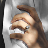 white gold round solitaire engagement ring with a diamond wedding ring with round diamonds set in single claws 