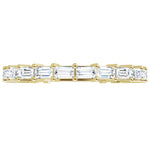 yellow gold diamond eternity ring with baguette diamonds