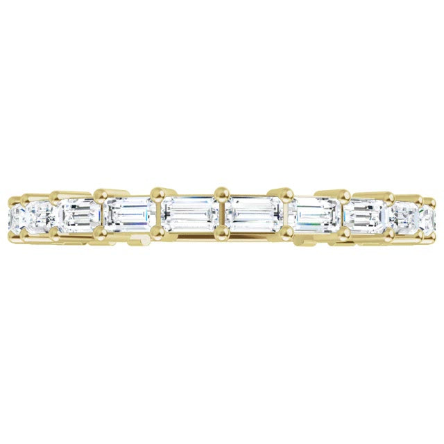 yellow gold diamond eternity ring with baguette diamonds