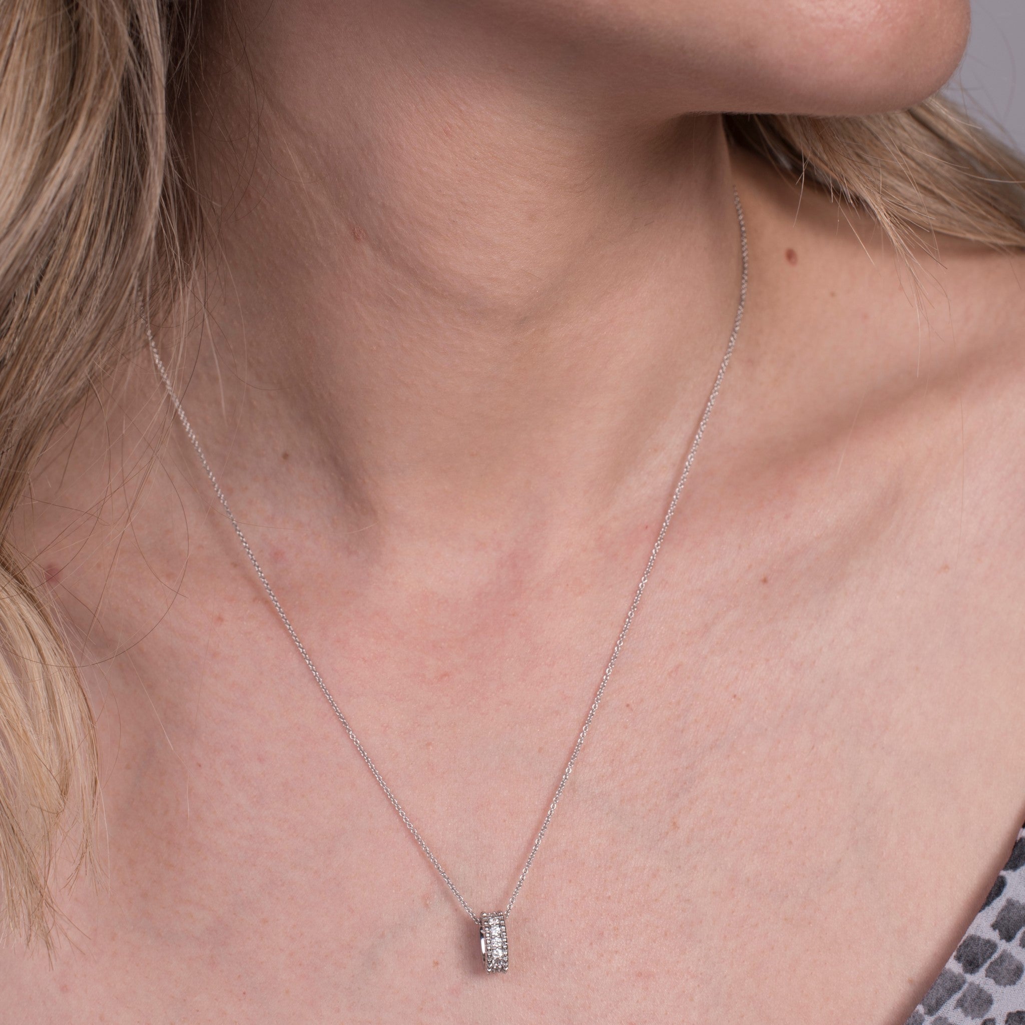 white gold sparkly cylinder pendant and necklace