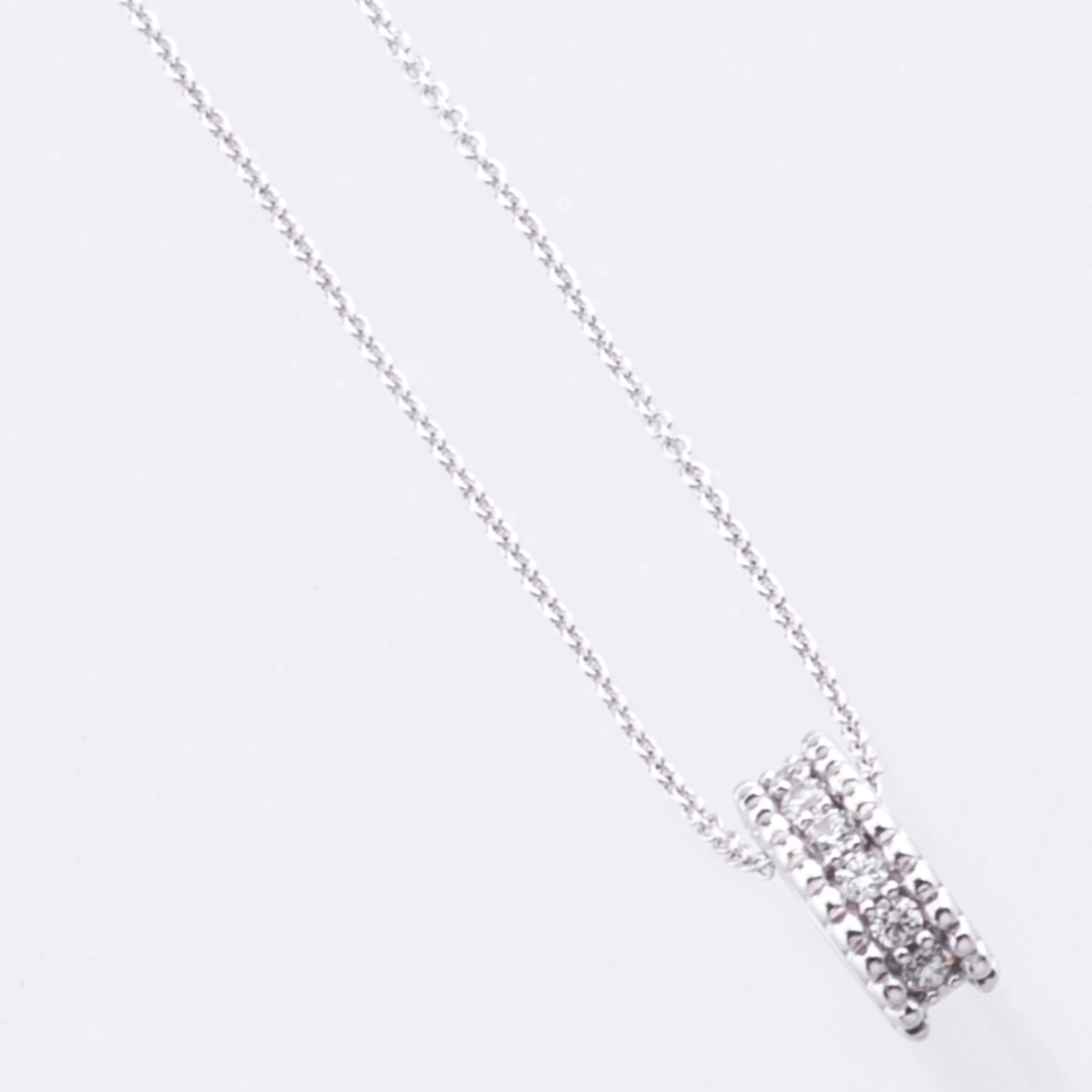 silver sparkly cylinder pendant and necklace